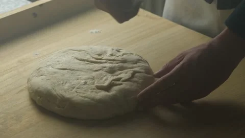 Man Applying Flour on Pizza Dough, Homemade Healthy Food Video stock 137453713