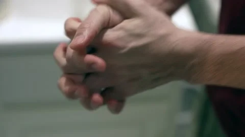 Man applying hand cream close-up Stock Footage 147953944