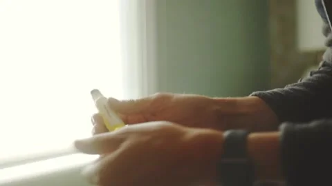 Man Applying Roll-On Perfume On His Wrist. Close Up Stock Footage 217915569