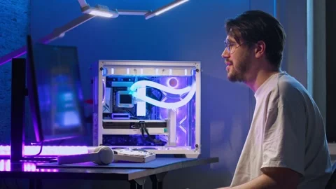 Man appreciated that it was easier for him to work at the computer with glasses. Stock Footage 279020148