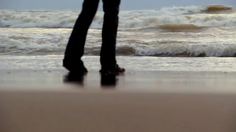 A Man Approaches To Ocean Surf Line In The Evening Stock Footage 86098645