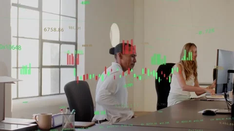 Man approaching desk and joining woman, adjusting monitor and typing, reviewing Stock Footage 332545354