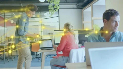 Man approaching showing tablet to seated woman, yellow nodes linking screens for Stock Footage 336714170