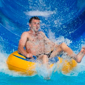 Man at aqua park Stock Photos