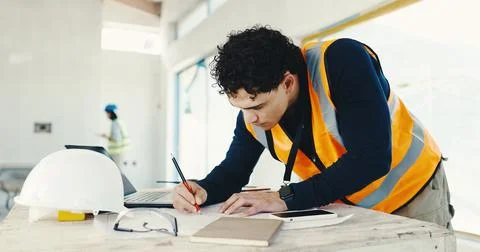 Man, architect and writing with documents on construction site for building Foto stock