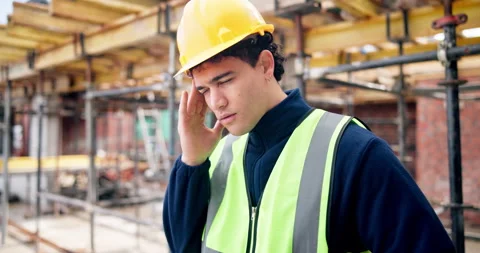 Man, architect or headache with stress on construction site for overworked Stock Footage 337155190