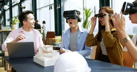 Man architect presenting building design through virtual reality glasses. Stock Footage 167905111