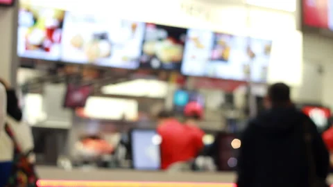 Man are waiting for their order at the counter of the food court. Fast food cafe Stock Footage 263330252