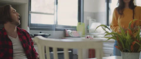 A man arguing with his girlfriend while they having a fight n at home Stock Footage 132364733