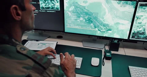 Man, army and typing with computer screen in control room, military battle and Stock Footage 303557612