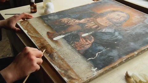 Man Artist, Working in the Studio, Restores the Icon of the Orthodox Saint, Stock Footage 71552546