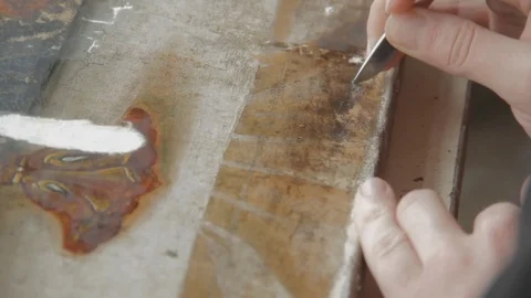 Man Artist Working in the Studio Restores the Icon of the Orthodox Saint Stock Footage 71552670