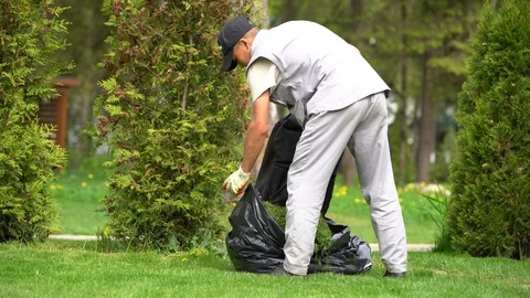 A man of Asian appearance in a gray work Stock Footage 108985186