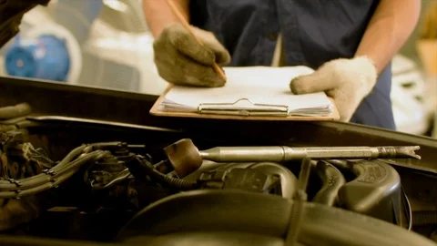 Man asian Checking Inspection period with car Stock Footage 111499209