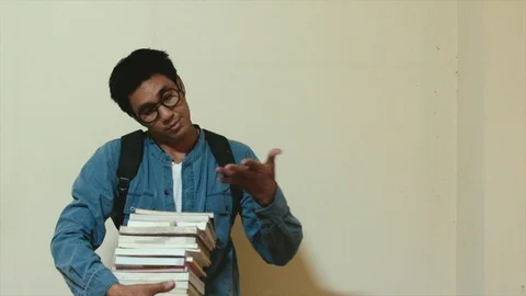 Man asian Overdo reading work without break For education Stock-Footage 106321395