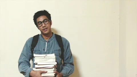 Man asian Overdo reading work without break For education Stock Footage 106321651