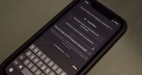 Man asked "How do I make an HTTP request in Javascript?" to ChatGPT Stock Footage 232040555