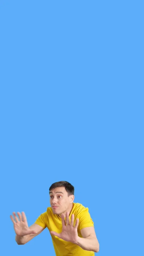 A man asking for silence at the camera and audience 動画素材 252483995