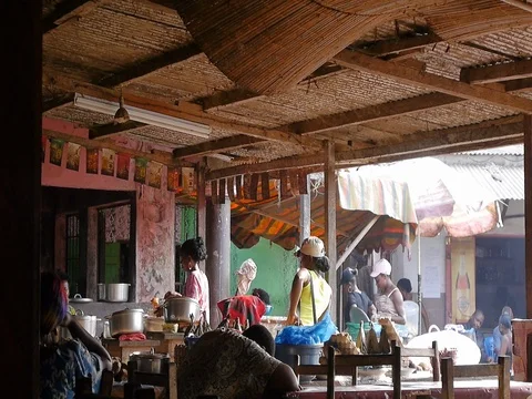 Man asleep in a road restaurant Stock Footage 80622034