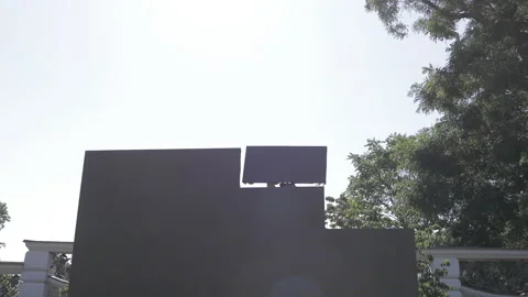 A man assembles LED panel elements, assembling a large LED screen Stockbeeldmateriaal 143035274