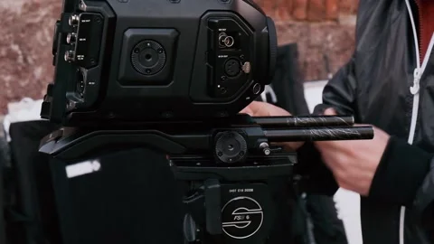 Man assembling and setting up telecamera, details, closeup. 스톡 동영상 203877579