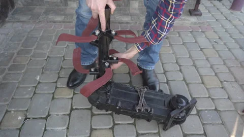 Man assembling cultivator knives Video stock 303281726