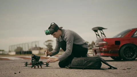 Man assembling an FPV drone Stock Footage 263995175