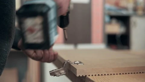 Man assembling furniture. Stock Footage 237388864