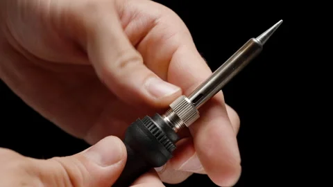 Man Assembling Soldering Iron Fitting Replacement Tip for Electronics Soldering. Stock Footage 276753757