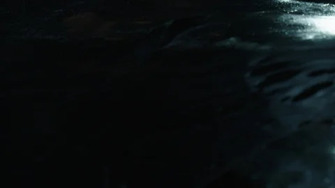 Man in astronaut suit exploring an ice cave, Iceland Stock Footage 104237517