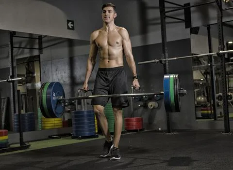 Man athlete doing exercise Stock Photos