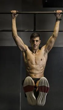 Man athlete doing exercise Stock Photos