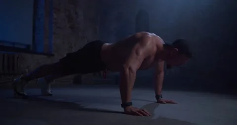 Man athlete doing push ups in a urban gym. Perfect for fitness and workout Stock Footage 149685067