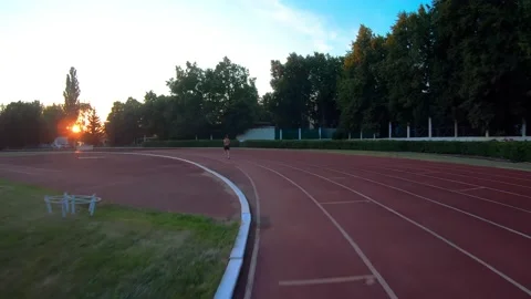 Man athlete jogging, training of stadium Stock Footage 169406061