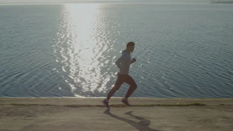 Man Athlete Is Training Outdoor Stock Footage 166502637