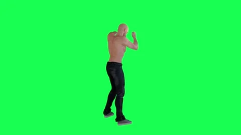 A man with an athletic figure on a green screen with no clothes and body with ha 動画素材 246419102
