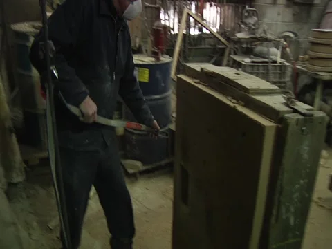 Man Attaches Mold Halves Stock Footage 1089618