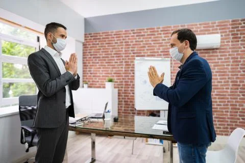 Man Avoiding Handshake To Stop Covid-19 Spread Stock Photos