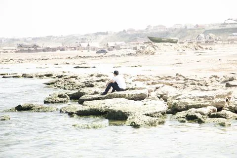 Man from Back Looking to Distance Over the Sea Stock Photos