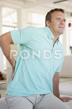 Man With Back Pain Stock Photos