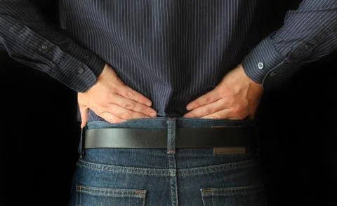 Man with back pain Stock Photos