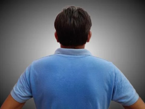 Man back side view on grey background Stock Photos