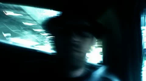 Man in back of taxi Stock Footage
