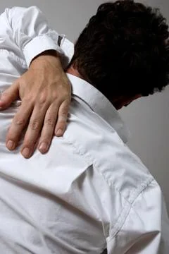 Man with backache Stock Photos