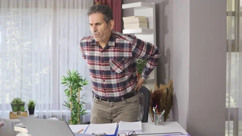 The man with a backache from working hard. Video stock 221661748