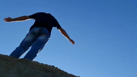 The Man on a background of blue sky. Man and sky. Stock Footage 156967142