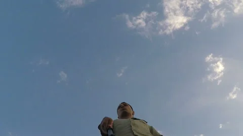 Man in background of sky Stock Footage 54598712