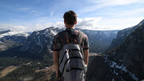 Man with backpack enjoy mountain in Yosemite National Park Stock Footage 97678261