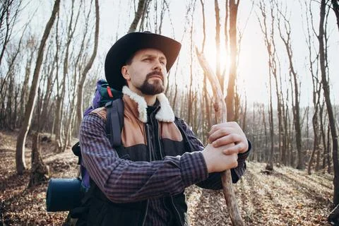 Man with backpack at forest Stock Photos