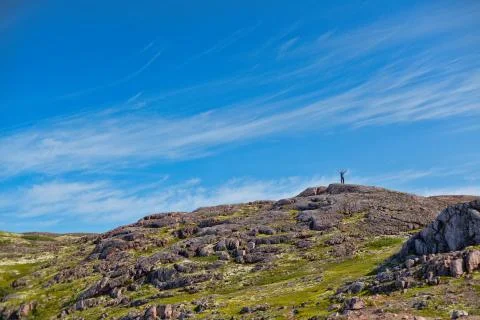 Man with a backpack on a mountain Stock Photos
